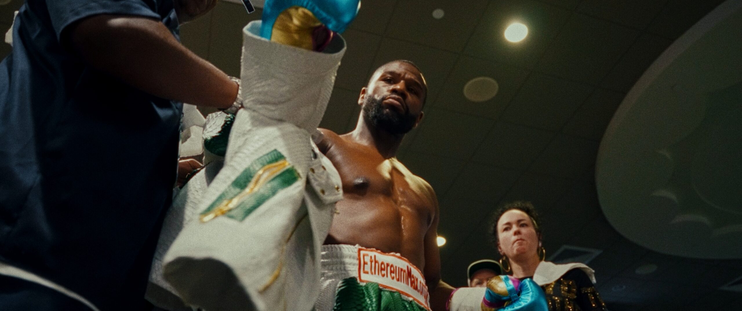 Floyd-Mayweather-URUS-jacket-by-Robert-Wunsch Floyd Mayweather getting handed boxer jacket.