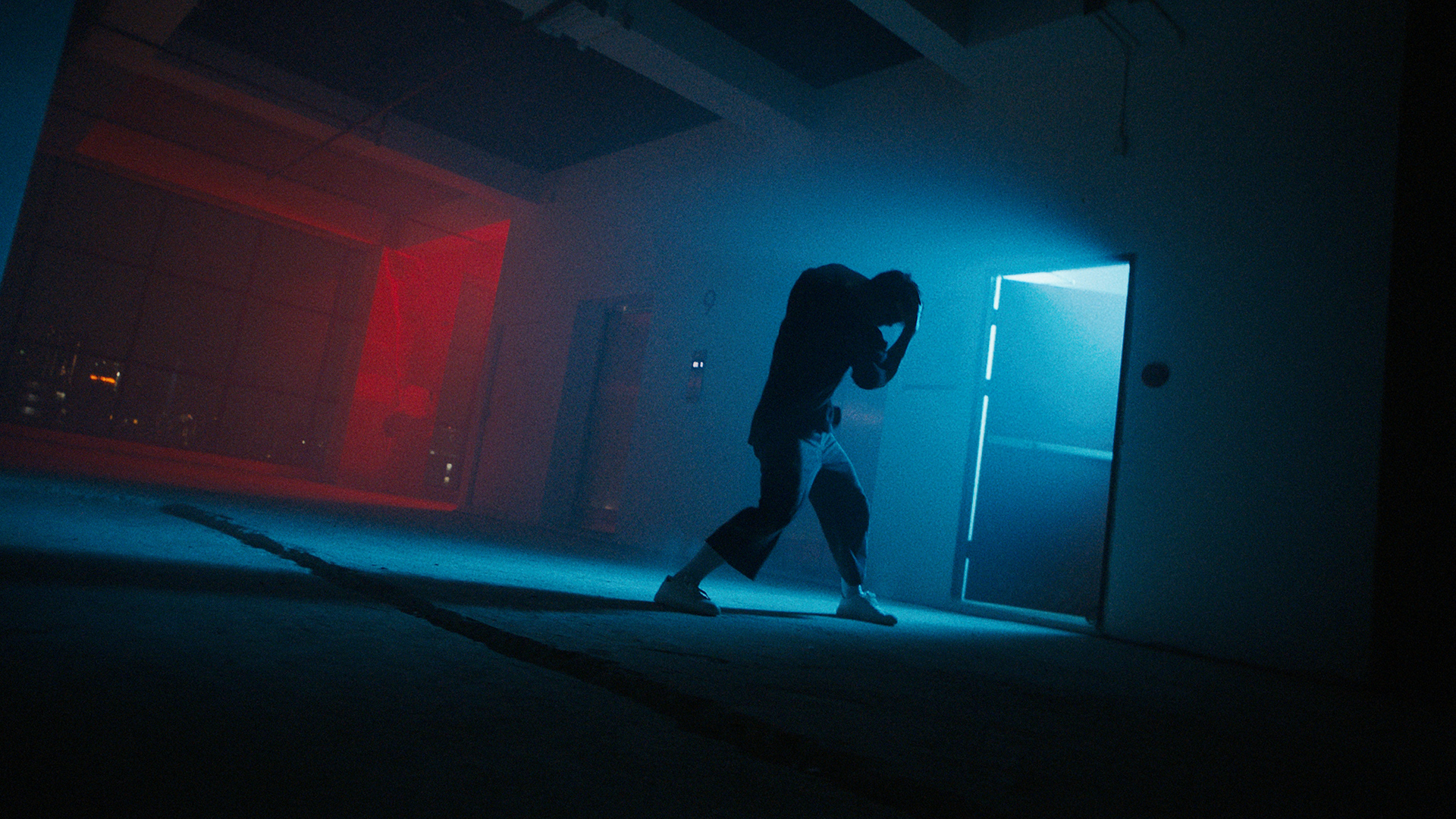 Rita-Ora-x-Tiago-PZK-x-Robin-Schulz-Ill-Be-There-dance-by-Robert-Wunsch Guy dancing in blue light.