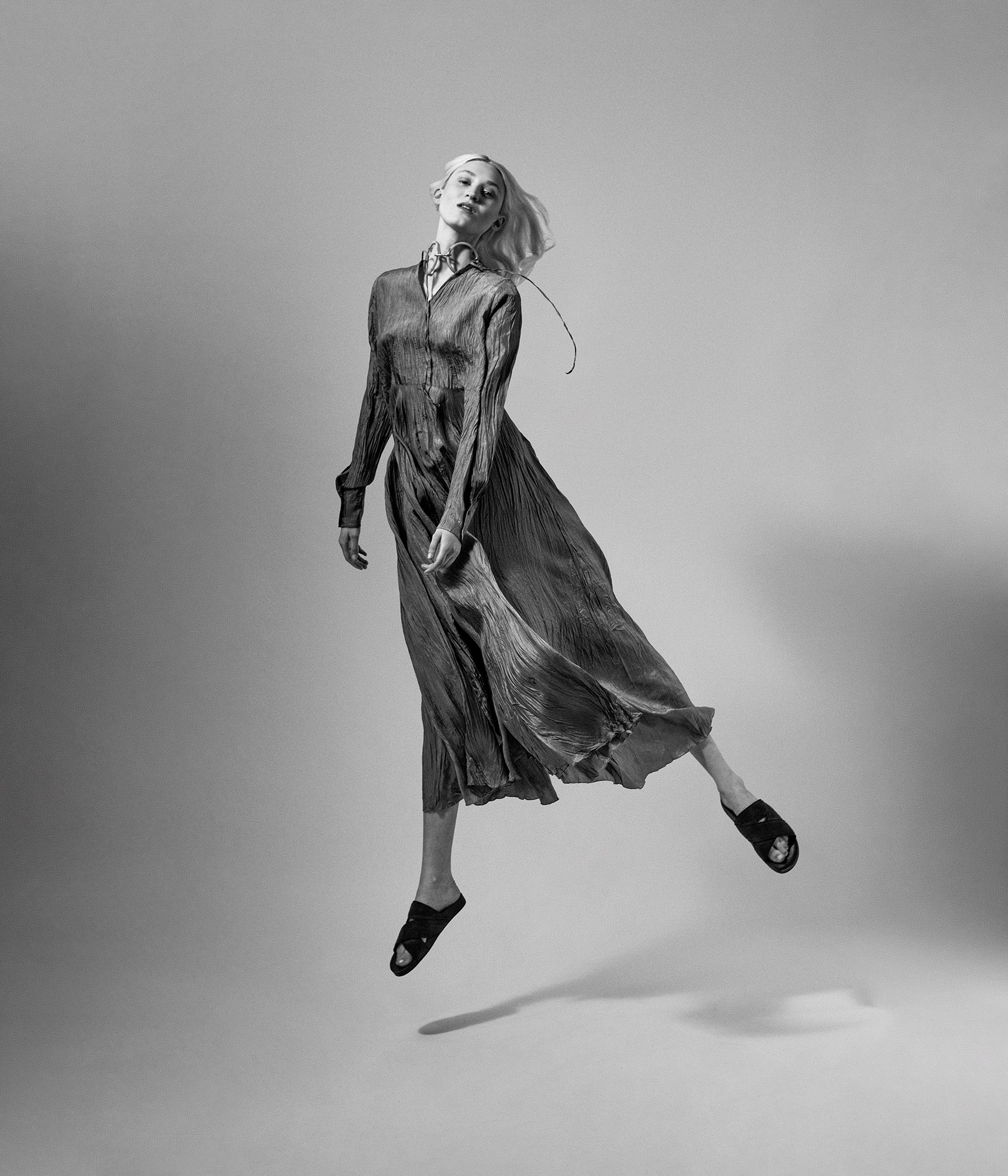 The-Row-campaign-flow-by-Robert-Wunsch Girl in a flowing dress jumping in the air